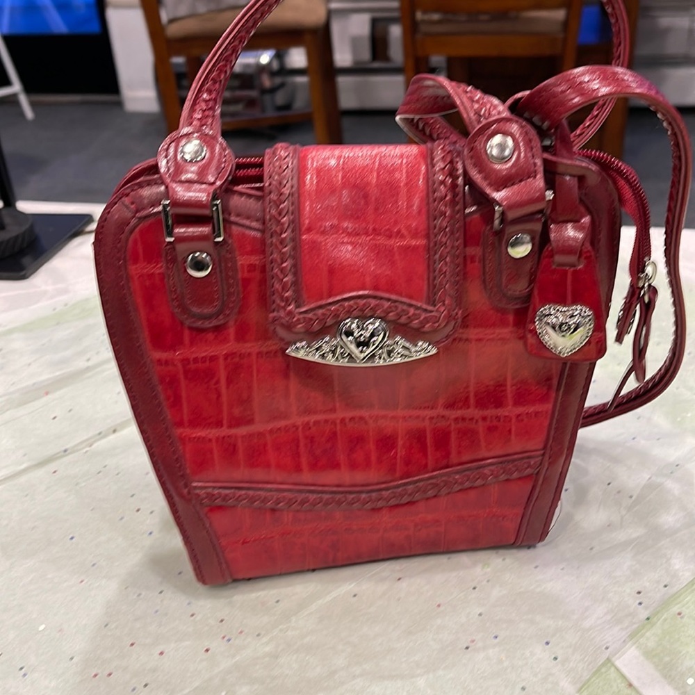 Little red shoulder bag, with zipper and pockets.open to offers.